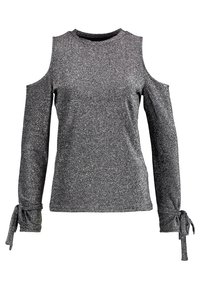 Långärmad glittrande silverblus med cold shoulder-utskärningar och knutna manschetter, rund halsringning, figurnära silhuett.