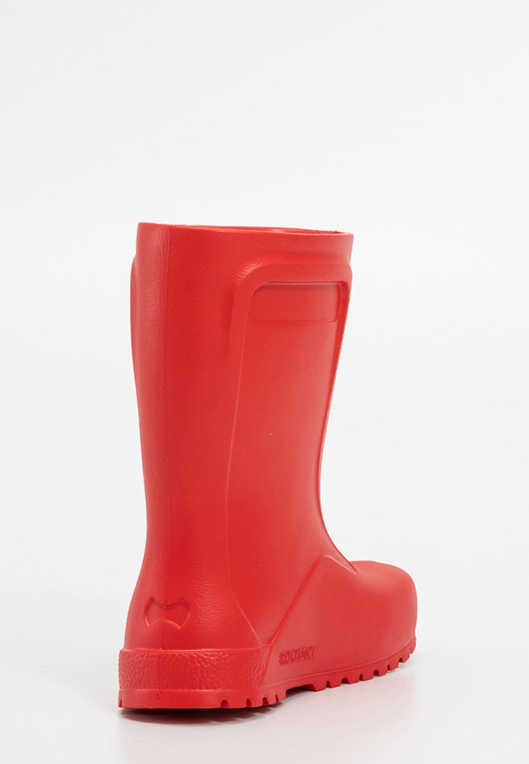 Rode rubberen enklaars met een gladde textuur, afgerond ontwerp en een lage hak. Beschikt over een subtiele logo op de hak en een verhoogde achterkant voor ondersteuning.