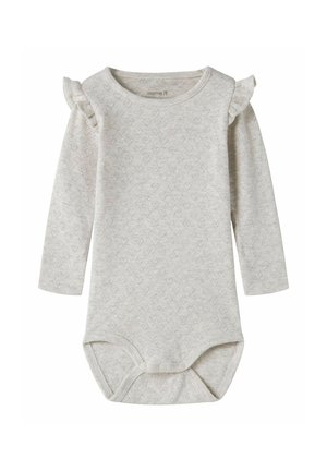 Body bébé beige à manches longues avec petits motifs en forme de cœur et détails à volants aux épaules, avec boutons-pression en bas.
