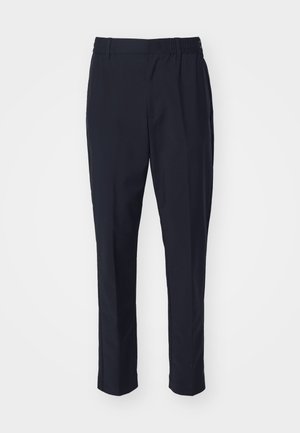 Pantalones azul marino con una textura suave, cintura elástica y diseño de pernera ajustada. No presenta bolsillos visibles ni adornos.