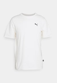 Hvid bomulds T-shirt med rund hals og korte ærmer. Har et lille sorte Puma-logo på brystet og et sort mærke på siden.