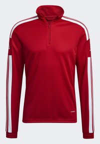 Red athletic shirt with a quarter-zip neck, long sleeves, and white stripes along the shoulders. Made of smooth, lightweight fabric.
