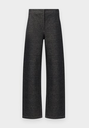 Bredde benbukser i svart denim. Har en teksturert overflate med en ren linning og ingen synlig maskinvare eller lommer.