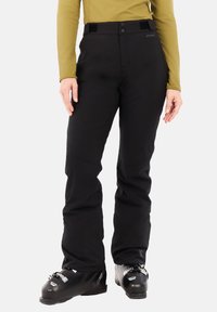 Zwarte skibroek met een rechte pijpdesign, gemaakt van duurzaam materiaal, voorzien van twee knopen en klittenbandsluiting bij de taille.