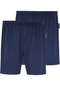 Dunkelblaue Baumwollshorts mit einem elastischen Bund. Glatte Textur, keine sichtbaren Muster und ein Etikett auf der linken Seite. Zwei Paare werden ausgestellt.