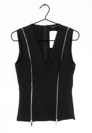 Schwarzes, ärmelloses Top mit tiefem V-Ausschnitt und zwei silbernen Reißverschluss-Akzenten auf der Vorderseite. Hergestellt aus glattem Stoff, ist es tailliert und hat einen versteckten Reißverschluss im Rücken.