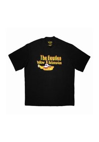 Black cotton t-shirt featuring yellow and red text "The Beatles Yellow Submarine" with a graphic of a yellow submarine. Short sleeves, crew neck.