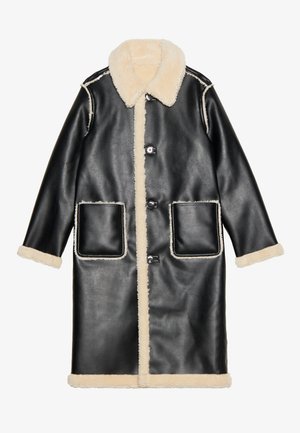 Black leather coat featuring a beige shearling collar and lining, front pockets, and button closures, with contrasting white stitching details.