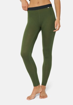 Leggings vert olive en tissu doux, avec une taille navy et un design ajusté qui va jusqu'aux chevilles.