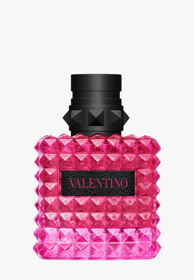 Pink studded glass perfume bottle with black cap and Valentino label in black with pink text on front.