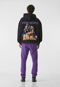 9N1M SENSE ESSENTIAL - Träningsbyxor - purple