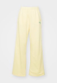 Nike Sportswear PANT - Tracksuit bottoms - alabaster