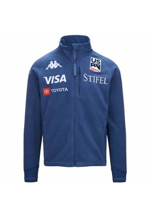 Giacca sportiva blu con zip, con il logo del Team Sci USA e i loghi degli sponsor Kappa, Visa, Toyota e Stifel sul davanti.