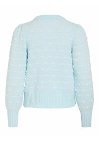 Pull tricoté bleu clair avec manches longues bouffantes et petit motif de points blancs en relief sur toute la surface.
