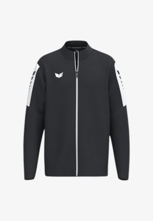 Schwarze Sportjacke mit Reißverschluss, weißen vertikalen Streifen an den Ärmeln und kleinem weißem Logo auf der linken Brustseite.