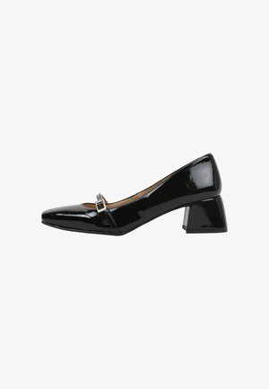 Escarpin en cuir verni noir avec un bout pointu, un talon moyen et une petite boucle décorative sur le dessus du pied pour une touche de détail.
