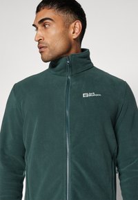 Jack Wolfskin WINTERSTEIN  - Jachetă din fleece - black olive/black olive
