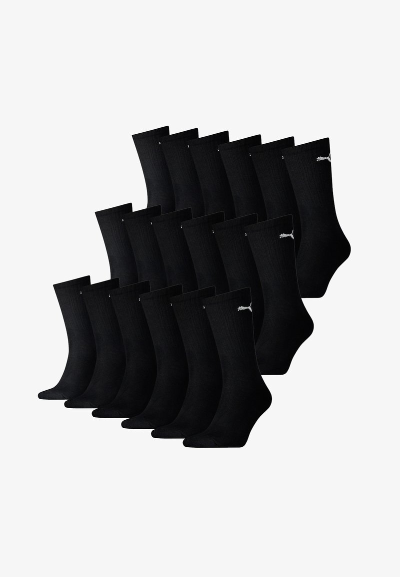 Schwarze Socken, geripptes Design, mit kleinem weißen Logo an der Seite. Set aus 15 Paar, typische Crew-Länge, aus gestricktem Material.