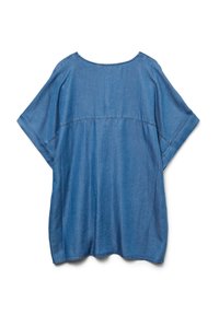 Loose-fitting blue denim short-sleeve blouse with a rounded neckline and seam detail across the back, displayed on a white background.