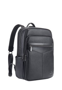 Zaino in pelle nera con superficie texturizzata, molteplici scomparti con zip, linee eleganti e spallacci imbottiti regolabili.