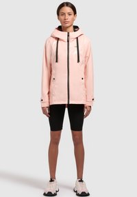 Rosa vattentät jacka med huva, svart dragkedja och dragsnören. Designad med långa ärmar, fållade muddar och en snygg finish.