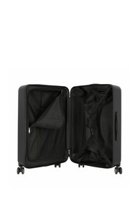 Valigia rigida nera con due compartimenti, tasca con zip in rete, cinghie incrociate e quattro ruote per una facile mobilità. Interno rivestito in tessuto.