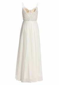 Robe blanche sans manches avec bretelles spaghetti, corsage orné de perles florales, et longue jupe fluide en chiffon.