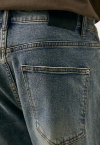 Don't Waste Culture KEONE UNISEX - Džíny Straight Fit - light pale