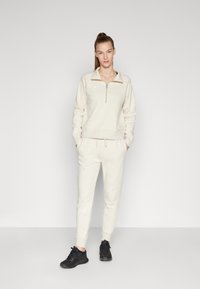 Under Armour RIVAL FLEECE - Felpa - oatmeal light heather/white