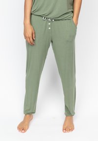Lichte, olijf-groene loungebroeken met een relaxte pasvorm, een trekkoord in de taille, knoopaccenten en zijzakken. Glad textuur overal.