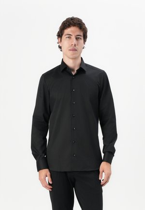 Black long-sleeve shirt in a smooth fabric with a classic collar, front button closure, and buttoned cuffs, featuring a tailored fit.