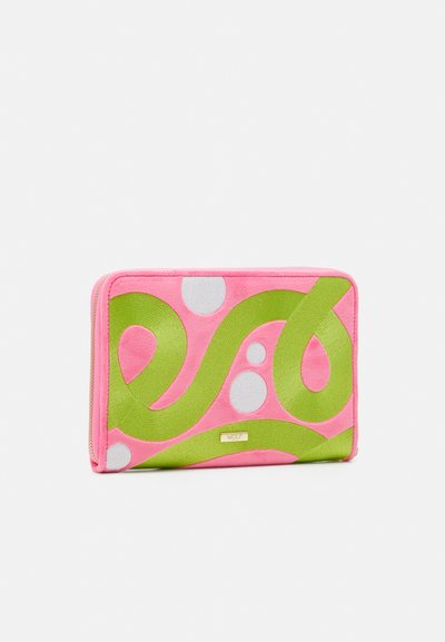 Fabric wallet in pink with green abstract swirl pattern and white dots. Features gold-tone logo plaque and zip closure. Smooth texture.