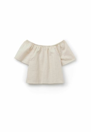 Haut beige à manches courtes épaules dénudées, avec encolure élastique et coupe ample, présenté sur fond blanc.