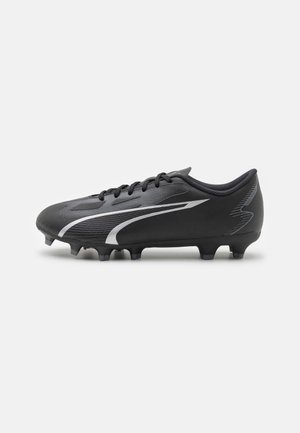 Black soccer cleat with silver curved design, laces, and molded studs on the sole, shown from the outer side on a white background.