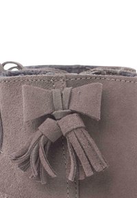 Pisamonas Botines - topo
