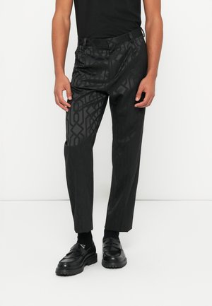 TEAGAN - Pantaloni - black