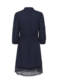 Navy dress with three-quarter lace sleeves, elastic waist, and decorative lace trim at the hem. Smooth fabric and relaxed fit.
