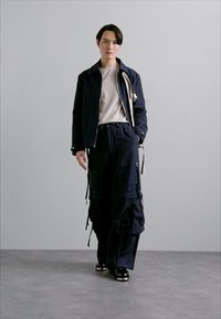 Dhruv Kapoor MODULAR PANTS - Reisitaskuhousut - navy