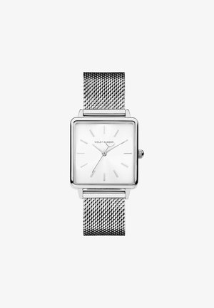 Vierkante zilveren horloge met een witte wijzerplaat en minimalistische uuraanduidingen. Voorzien van een zilveren mesh band en een slank profiel voor een strakke uitstraling.