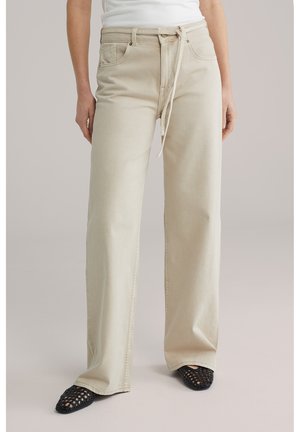 Brīva piegriezuma džinsi - beige