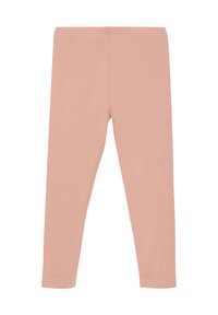 Rózsaszín leggings, amelyek puha, rugalmas anyagból készültek, sima felülettel, formázott szabásúak, látható varrások vagy díszítések nélkül.