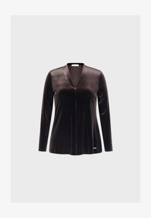 Haut long en velours noir avec un décolleté en V profond, texture lisse et design minimaliste. Présente un logo discret au niveau de l'ourlet.