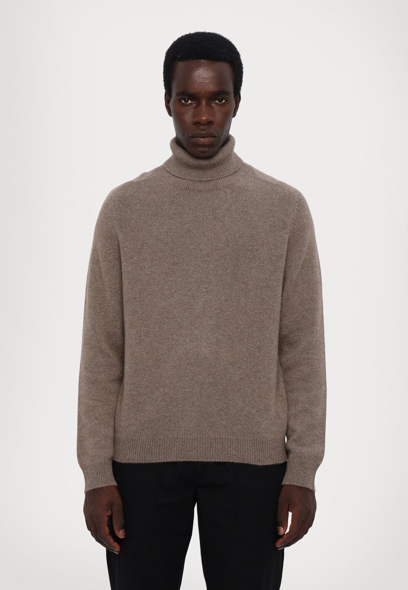 Beige coltrui in een zachte brei, met geribde boorden en onderkant, met een losse pasvorm en minimalistisch ontwerp.