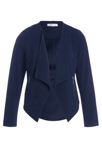 Mørkeblå, letvægt jakke med åben front, lange ærmer og sidelommer med lynlås. Den har en blød tekstur og en svajende design uden krave.