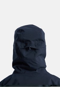 Black waterproof jacket hood shown from the back with adjustable drawstring and smooth fabric texture against a plain light background.