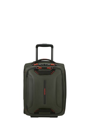 Green suitcase with black and orange accents, featuring a hard exterior, two wheels, and a telescopic handle. Front zip pocket included.