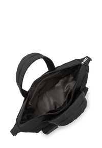 Borsa in tessuto nera con due manici, chiusura con zip e un ampio interno caratterizzato da una fodera marrone liscia e una tasca con zip aggiuntiva.