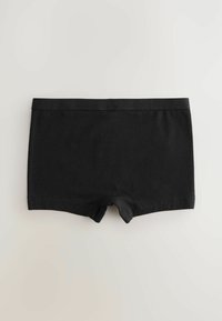 Boxeri negri din bumbac cu o textură netedă și un brâu lat, plat, care are imprimat subtil numele brandului "NEXT".