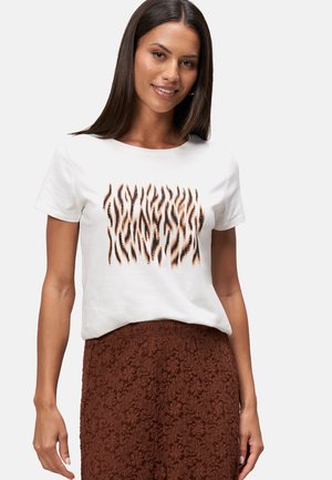 White cotton t-shirt featuring a wavy, brown and black abstract pattern across the front. Short sleeves and a crew neckline.