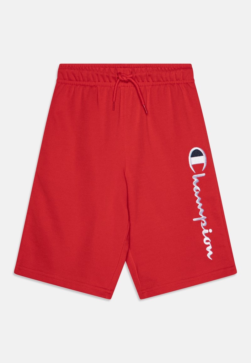 Shorts rouges avec taille élastique et cordon de serrage, avec logo Champion blanc brodé sur la jambe droite.
